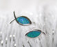 Earrings: Ichthus Blue Opal, Sterling Silver accented with Blue Opal. Posts with Push Backs