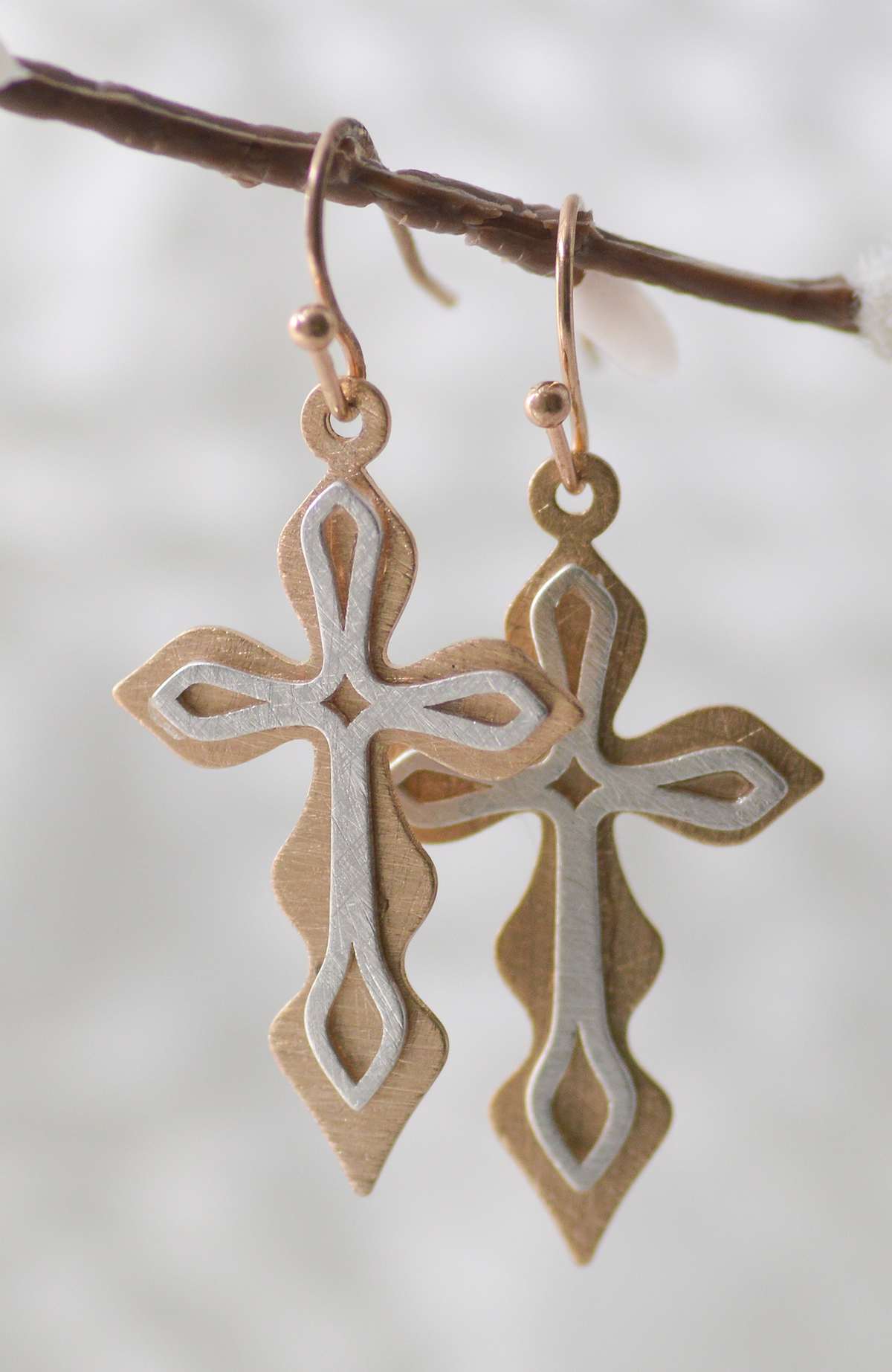 Earrings: Silver/Gold Cross, Brass base with Silver and Gold Overlay and Rhodium plating that prevents tarnishing.  Fish Hook Back