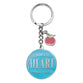 Metal Keyring in Tin: Blue, Apple, Let All That You Do Be Done in Love