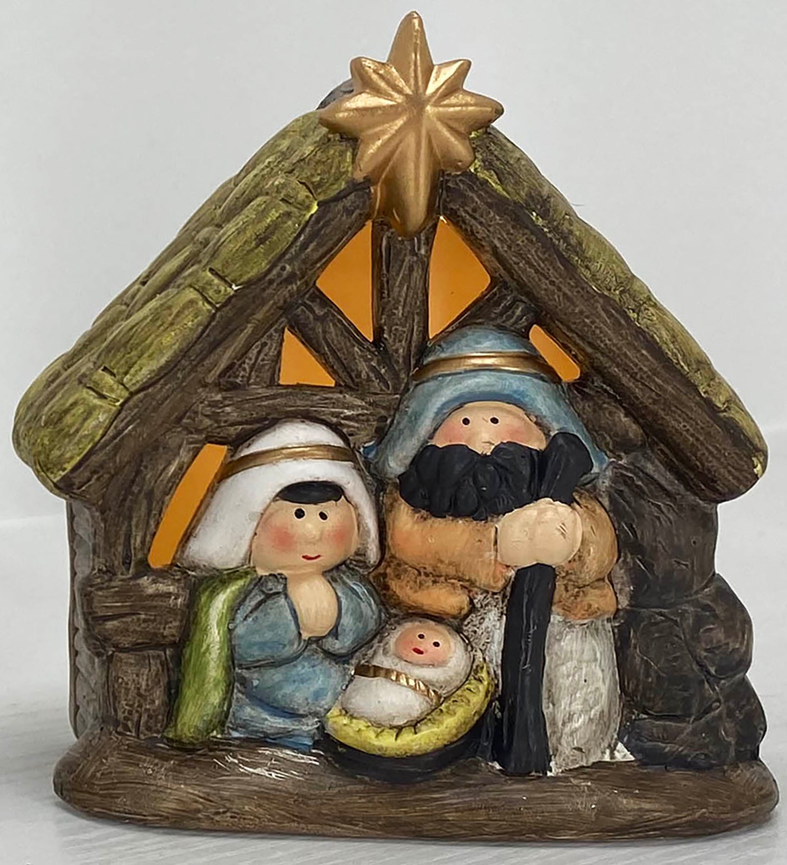 Ceramic Manger with LED: Colourful, barn shape, comes in a white box