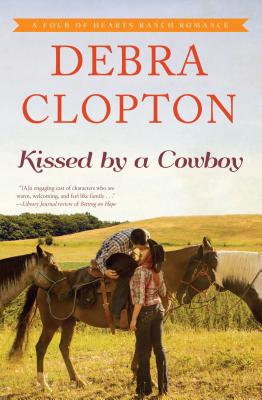 Kissed By a Cowboy (Large Print) (#03 in Four Of Hearts Ranch Romance Series)